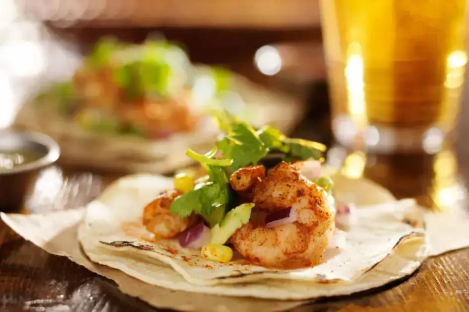 A palavra chave é Tacos de Camarão com Tortilhas de Milho.